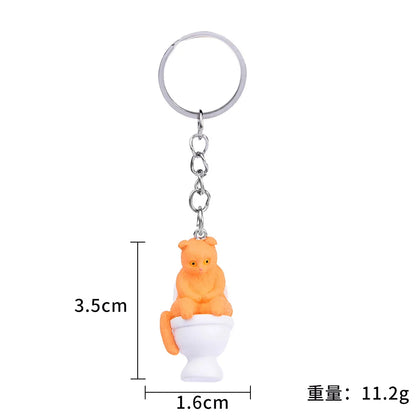 Funny Cat on Toilet Keychain – Cute and Quirky Accessory for Cat Lovers