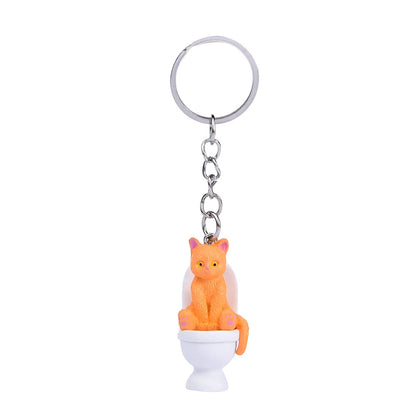 Funny Cat on Toilet Keychain – Cute and Quirky Accessory for Cat Lovers