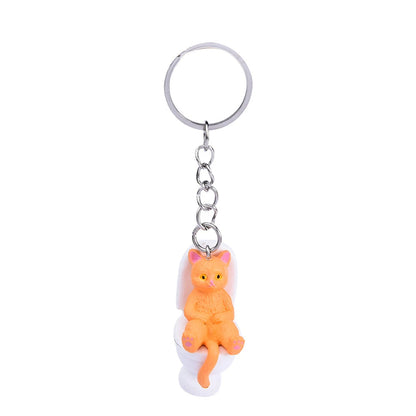 Funny Cat on Toilet Keychain – Cute and Quirky Accessory for Cat Lovers